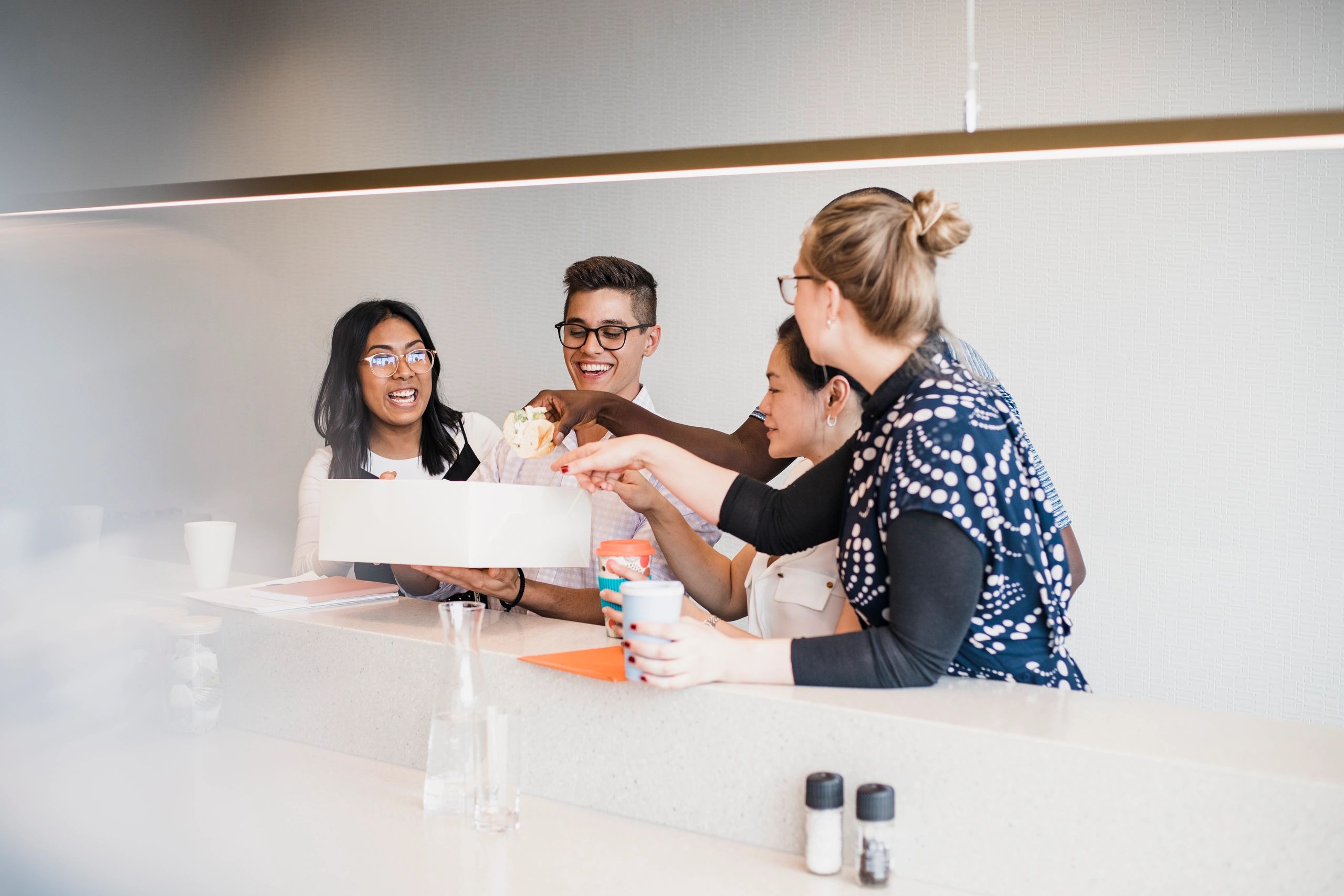Work colleagues collaborating during a break
