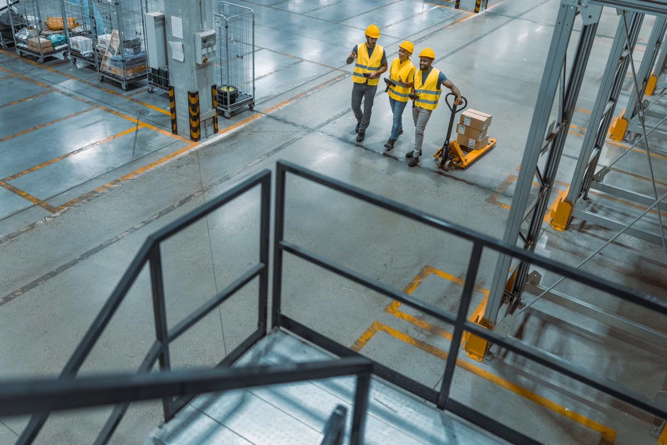Warehouse workforce team coordinating an inventory shift